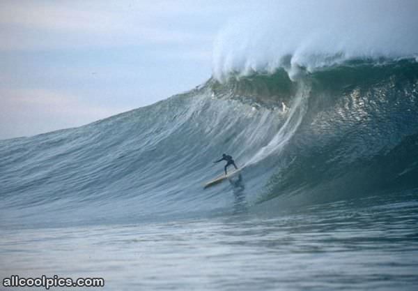 Surfing A Huge Wave